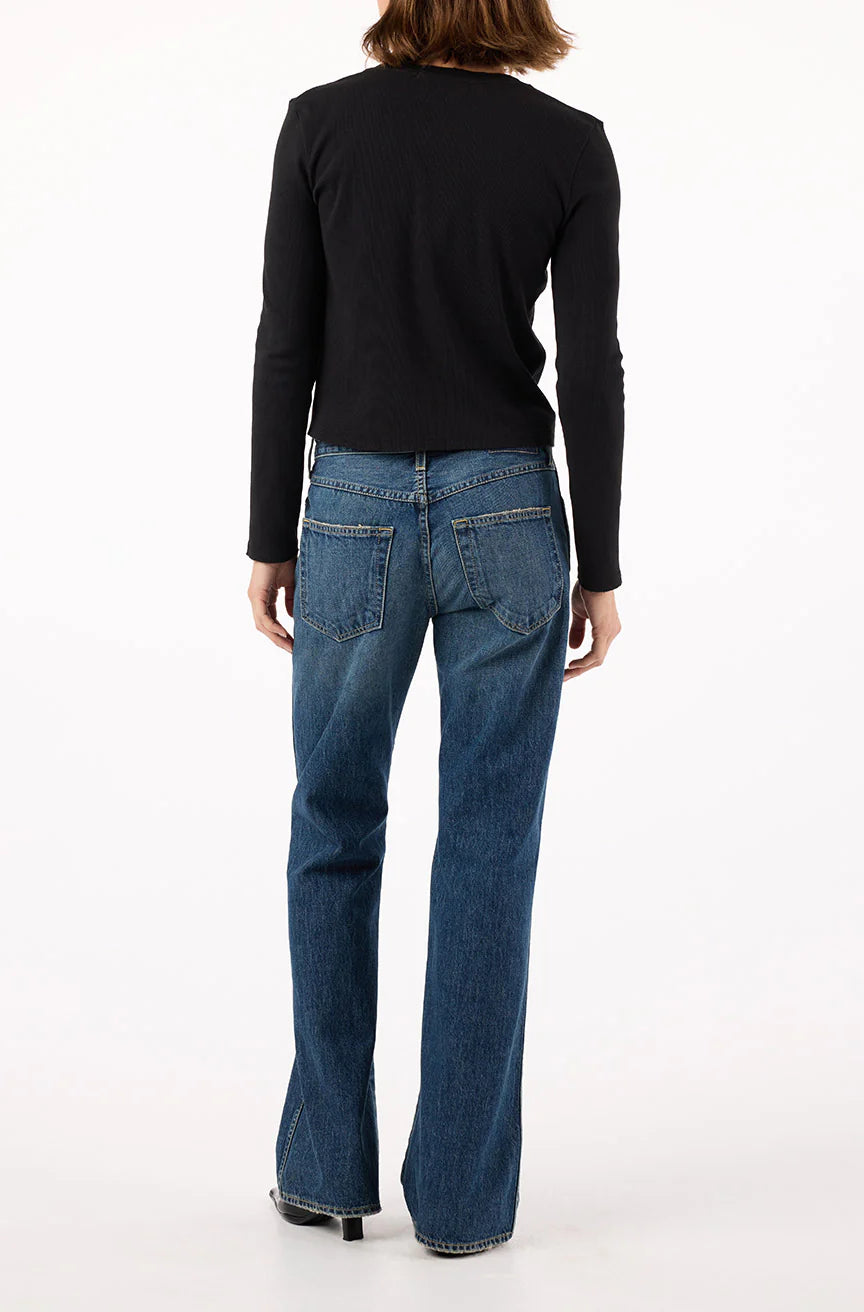 Image of model in AMO Denim 90s inspired Marcenia Cotton Low Rise Boot Cut Jeans - Ethically Made Fashion - Made in USA Women's Apparel