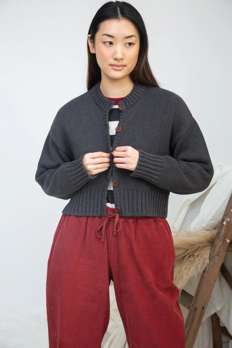 Image of model wearing BEAUMONT ORGANIC Sugi Cropped Organic Cotton Cardigan in Charcoal Marl