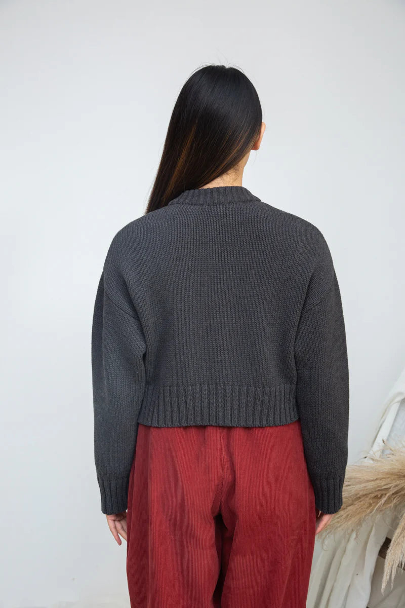 Image of model wearing BEAUMONT ORGANIC Sugi Cropped Organic Cotton Cardigan in Charcoal Marl