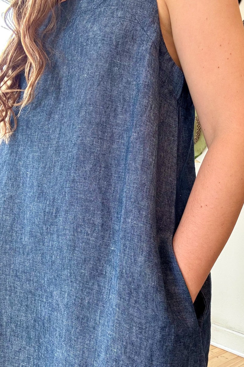 Image of IT IS WELL LA Linen Strap Sundress in Indigo. This dress has a square neckline + back, thick straps, hidden side pockets, and hits midi length. Made in USA.