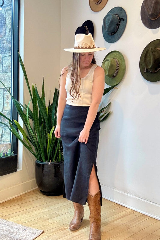 Image of IT IS WELL LA Linen Slit Skirt in Black. This classic, relaxed pencil skirt hits at the ankle with symmetrical side slits. Made in USA.