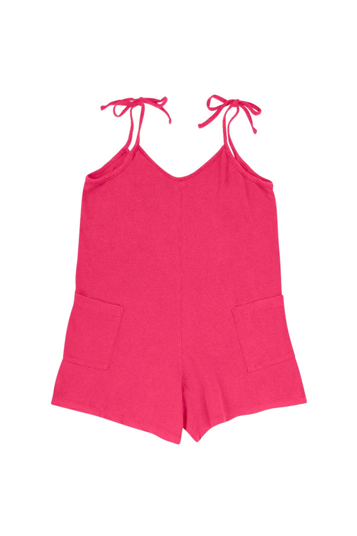 Image of Jungmaven Sespe Romper in Sunset Coral. Sespe Romper is a short coverall style romper with front patch pockets and adjustable spaghetti straps that tie at shoulder. Made in USA from Hemp-Organic Cotton Blend fabric.