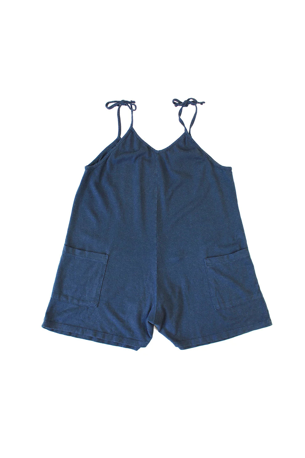 Image of Jungmaven Sespe Romper in Navy Blue. Sespe Romper is a short coverall style romper with front patch pockets and adjustable spaghetti straps that tie at shoulder. Made in USA from Hemp-Organic Cotton Blend fabric.