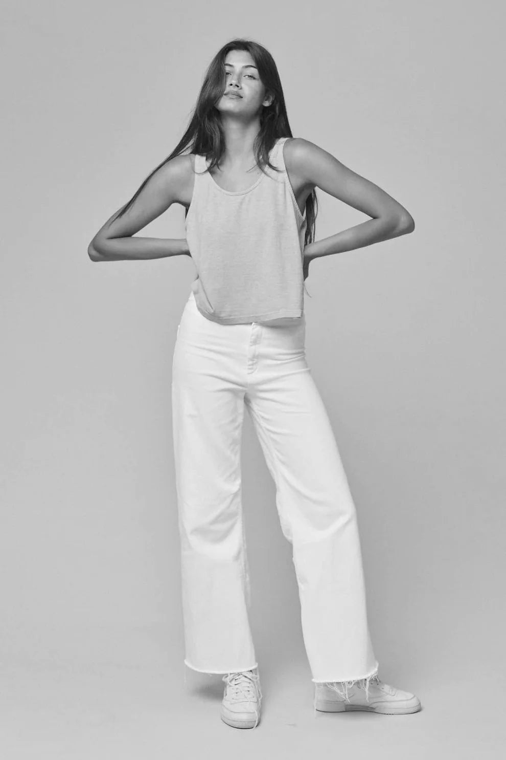 Image of Jungmaven Heathered Cropped Tank in Sunset Coral. Cropped Tank is a swinging tank top with side slit details and about 1/2 inch straps. Made in USA from Hemp-Organic Cotton fabric.