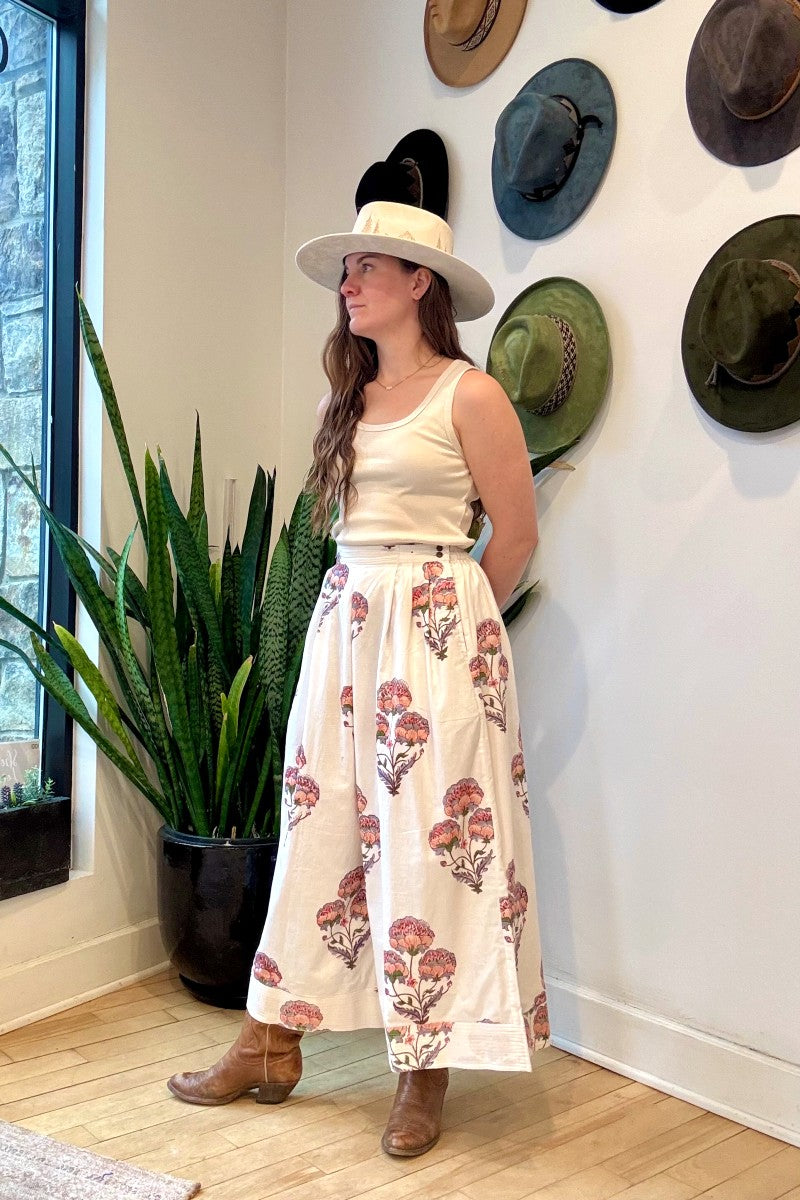 Image of model wearing MAELU DESIGNS Hand Block Printed Fleur Cotton Pant. Fleur Pants are a wide cut, culotte style trouser with a cropped length and all over floral print.