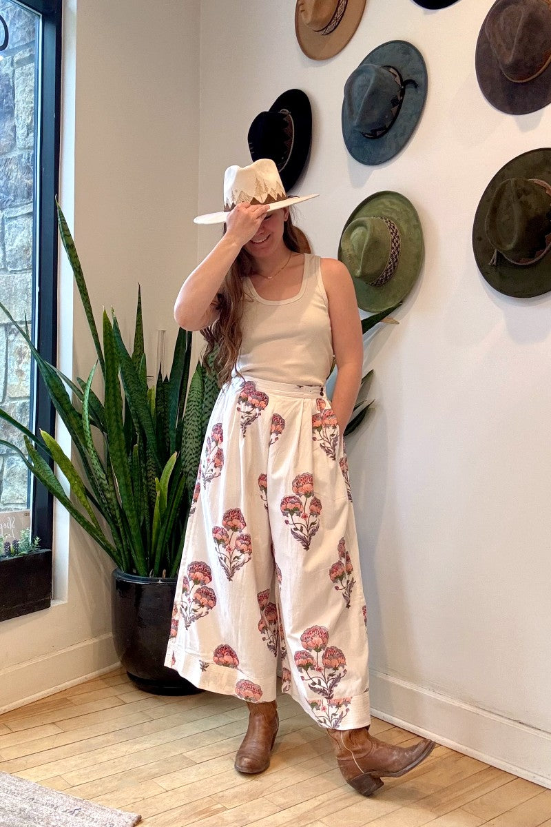 Image of model wearing MAELU DESIGNS Hand Block Printed Fleur Cotton Pant. Fleur Pants are a wide cut, culotte style trouser with a cropped length and all over floral print.