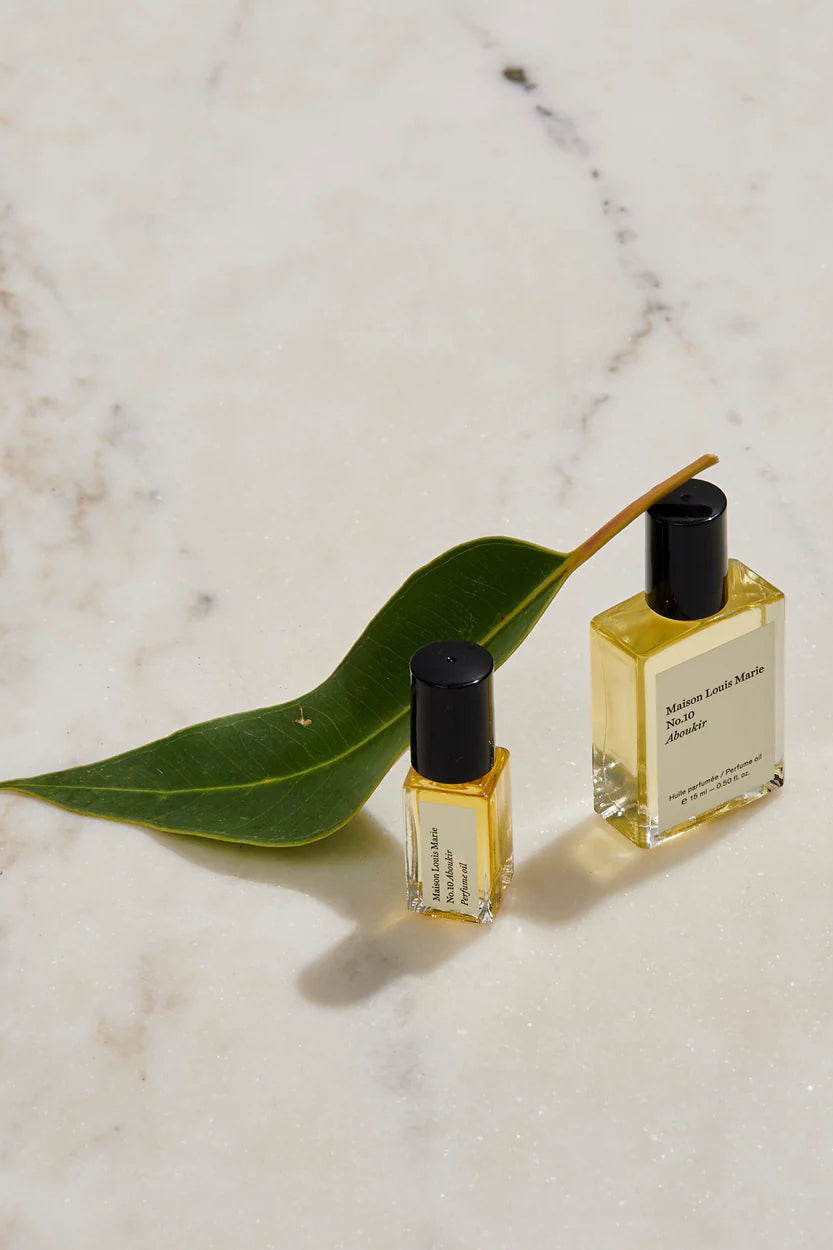 MAISON LOUIS MARIE Roll-On Perfume Oil Shown in Studio with Eucalyptus Leaf _ No. 10 Aboukir 0.5 fl oz Personal Fragrance