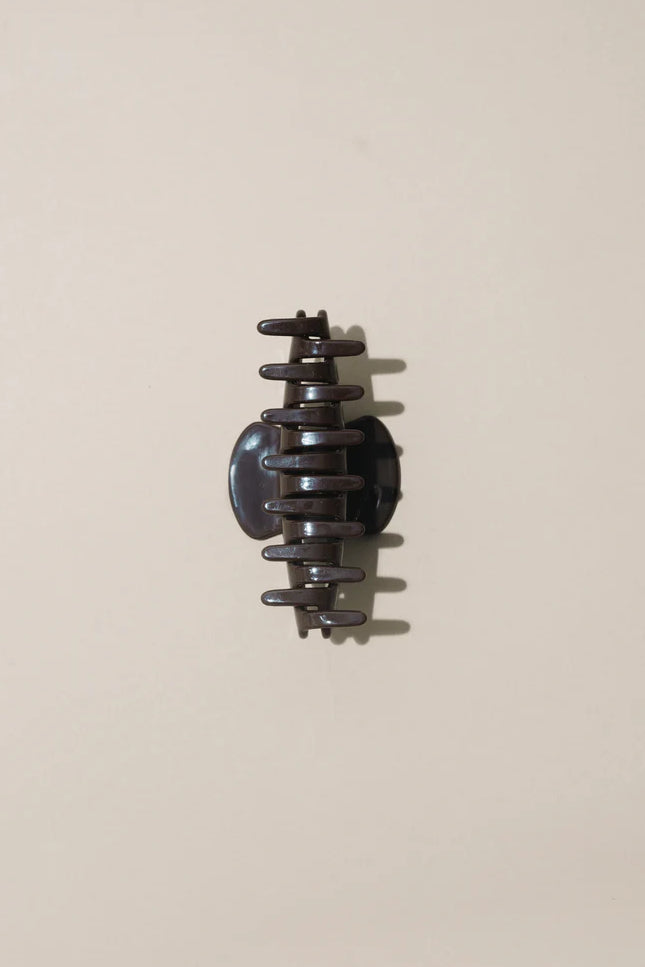NAT AND NOOR Ethically Made Sustainable Hair Accessories - Large 4" Minimalist Hair Claw in Chocolate Brown on Flat Surface