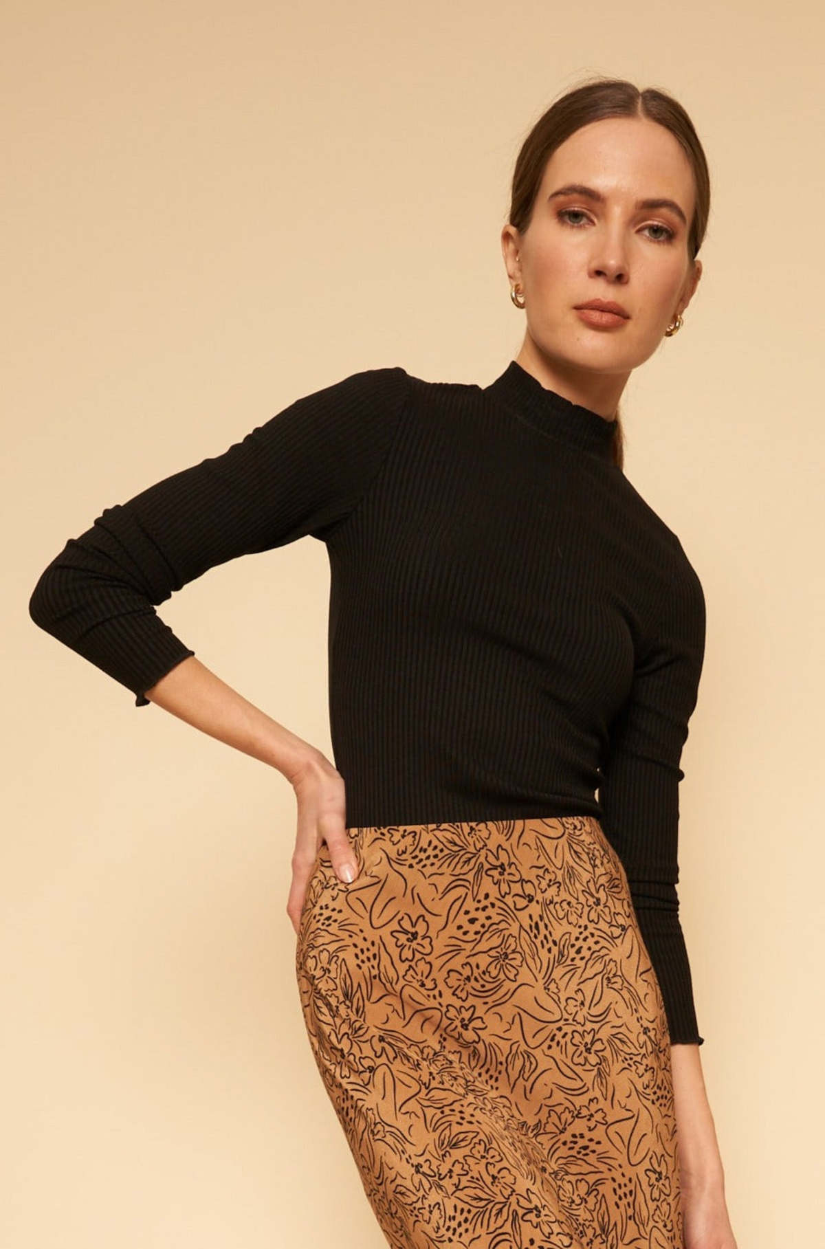 Image of model in Whimsy Row Black Eco-Rib Gigi Mockneck Top _ Eco-Friendly Women's Fashion Brands _ Made in Los Angeles USA Women's Apparel