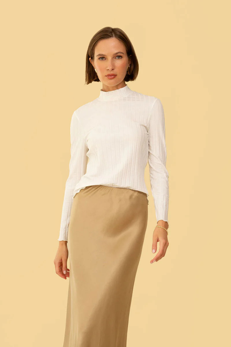 Image of model in Whimsy Row Cream Eco-Rib Gigi Mockneck Top _ Eco-Friendly Women's Fashion Brands _ Made in Los Angeles USA Women's Apparel