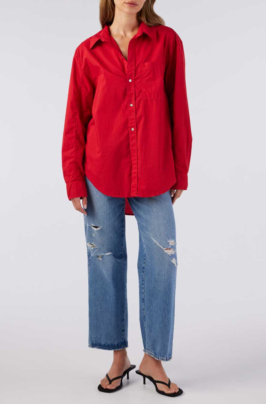 Image of model wearing AMO Denim Ruth Oversized Button Down Shirt in Cherry Red Cotton Poplin. Made in Peru premium women's denim and basics. Female founded and operated.