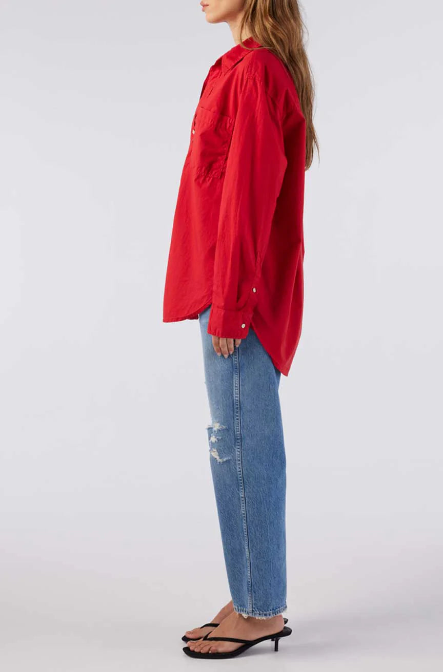 Image of model wearing AMO Denim Ruth Oversized Button Down Shirt in Cherry Red Cotton Poplin. Made in Peru premium women's denim and basics. Female founded and operated.