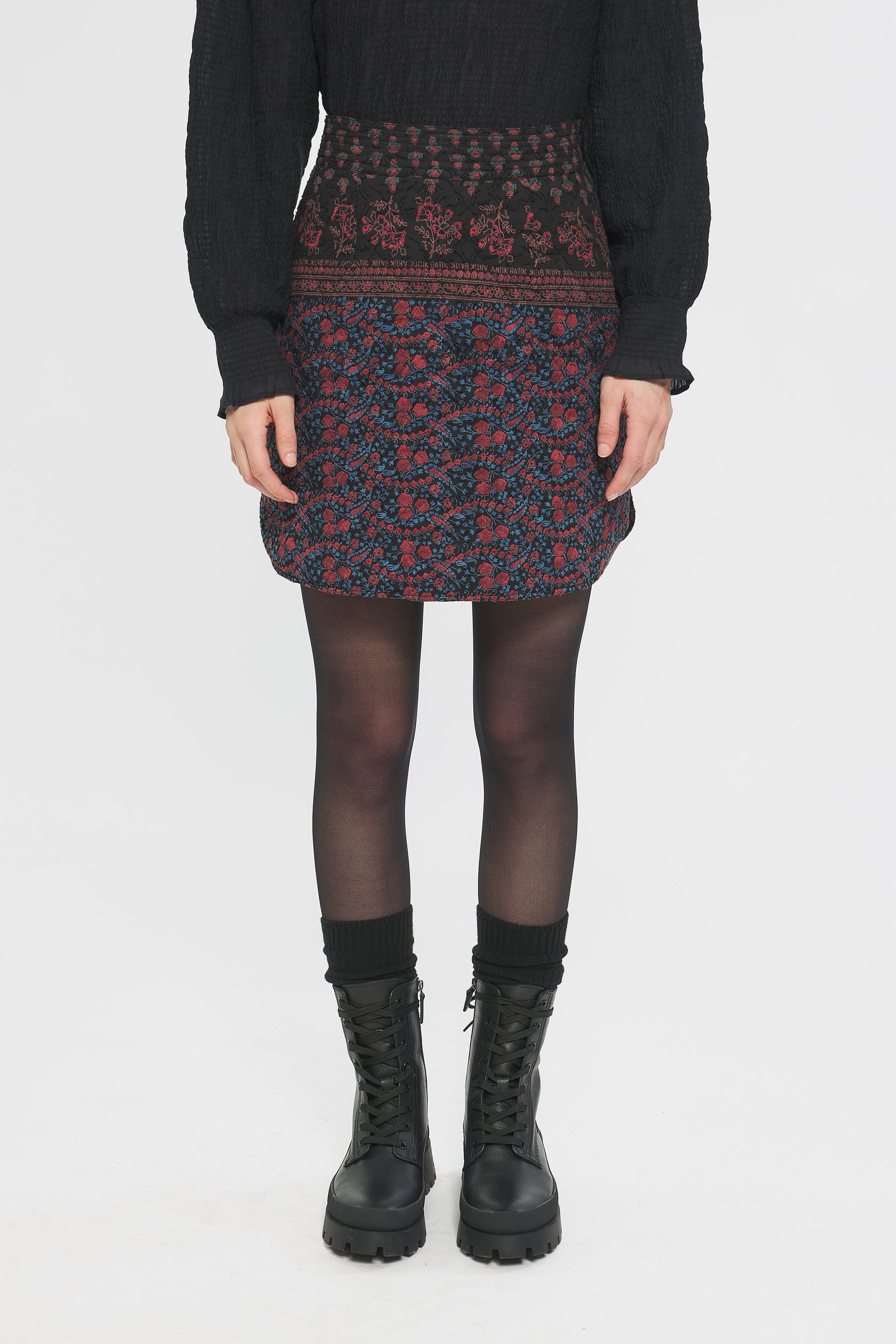 Image of model in Antik Batik Irina Quilted Cotton Jacquard Floral Block Print Winter Mini Skirt _ Ethical French Bohemian Fashion _ Artisan Made Sustainable High Fashion