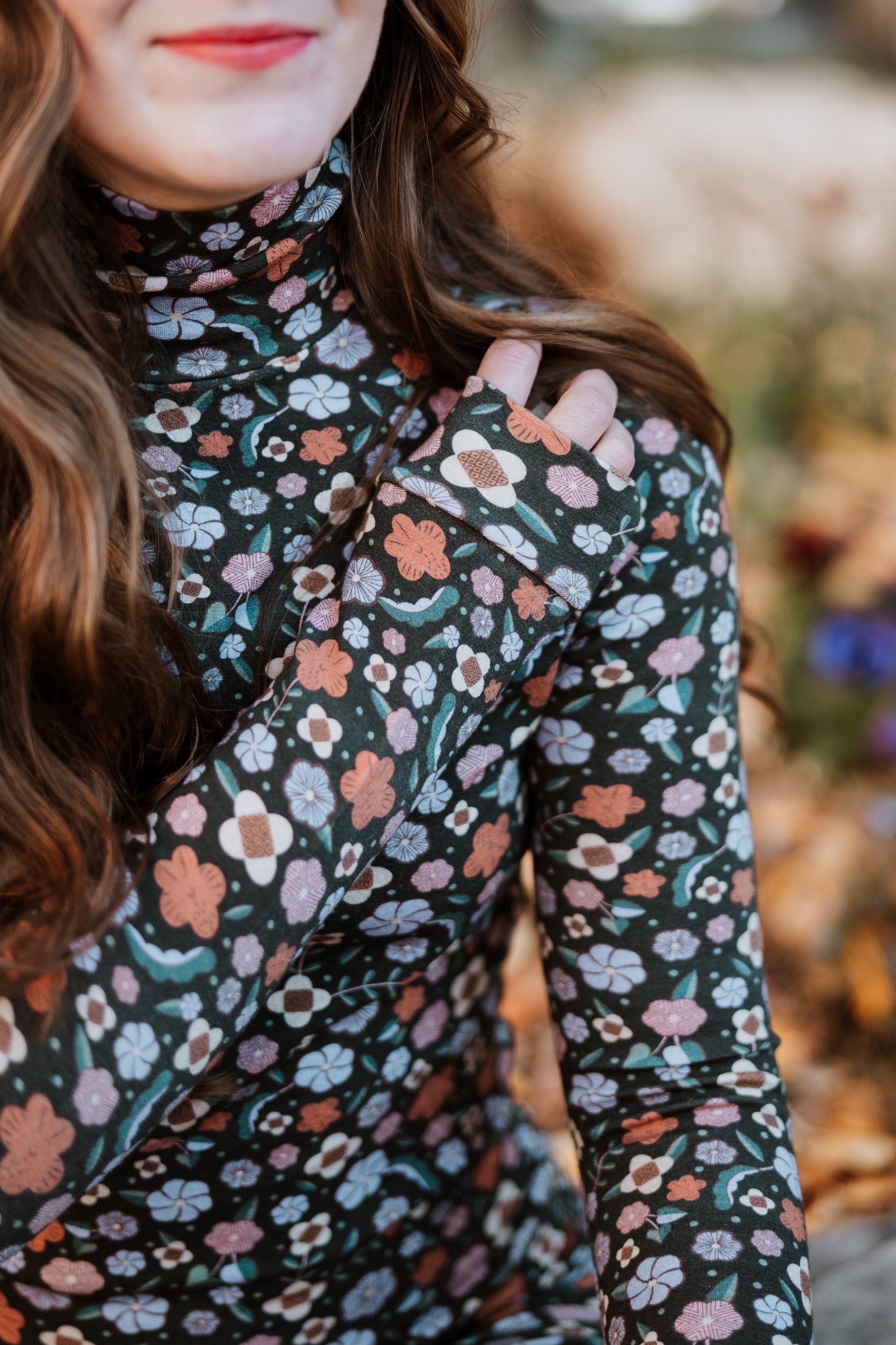 Close up of Antik Batik Matching Floral Aria Set _ Fitted Wool 60s Floral Print Turtleneck with Fitted Flared 60s Floral Legging Pants _ Ethical French Bohemian Fashion _ Artisan Made Sustainable High Fashion