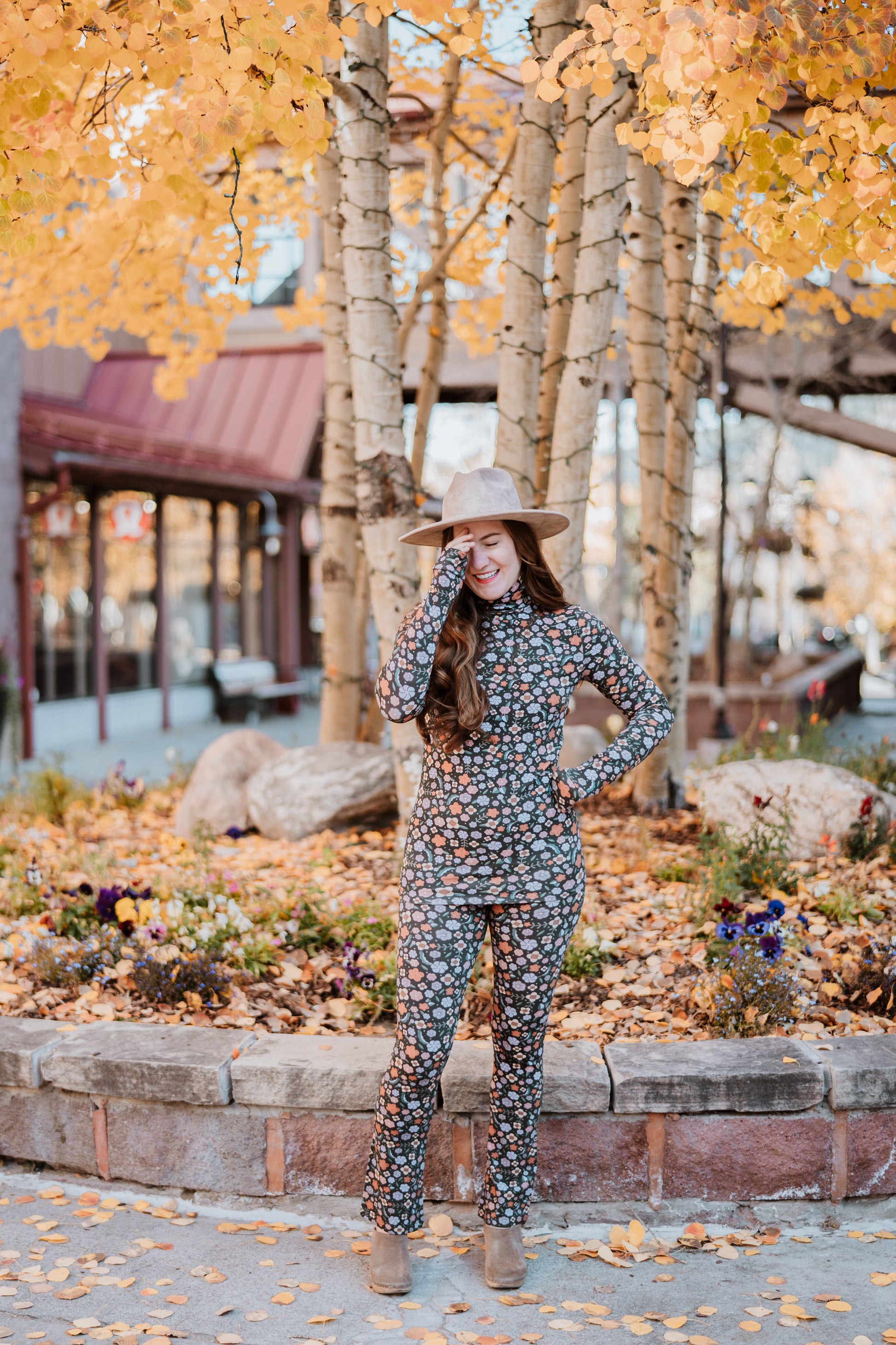 Image of model in Antik Batik Matching Floral Aria Set _ Fitted Wool 60s Floral Print Turtleneck with Fitted Flared 60s Floral Legging Pants _ Ethical French Bohemian Fashion _ Artisan Made Sustainable High Fashion