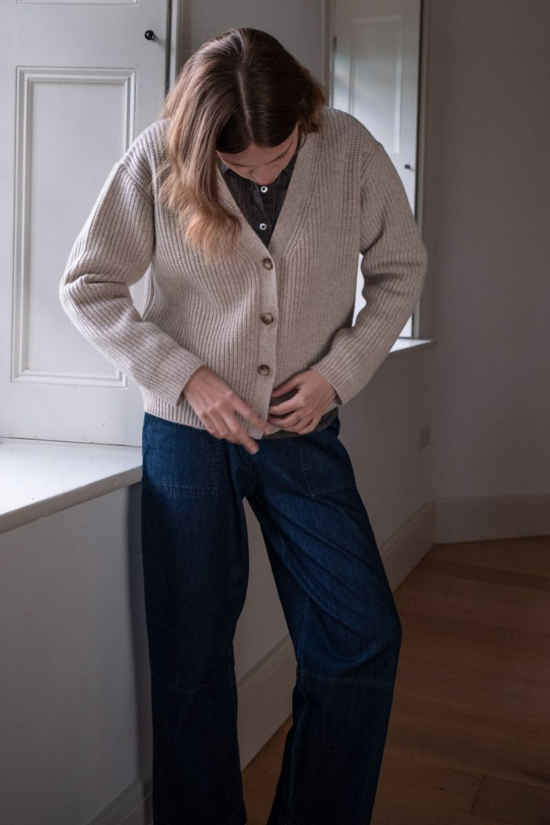 Image of model wearing BIBICO Fair Trade Clothing Adita Ribbed Cardigan in Natural White Wool