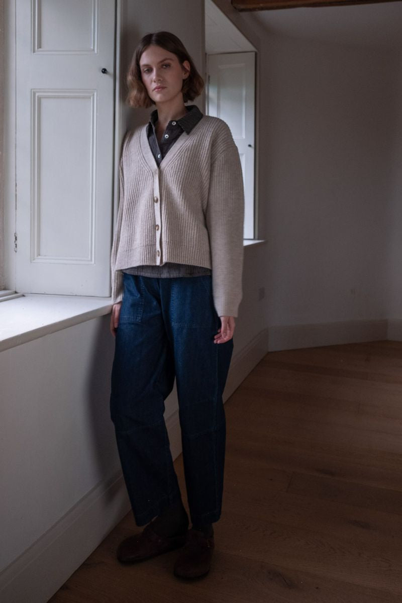 Image of model wearing BIBICO Fair Trade Clothing Adita Ribbed Cardigan in Natural White Wool