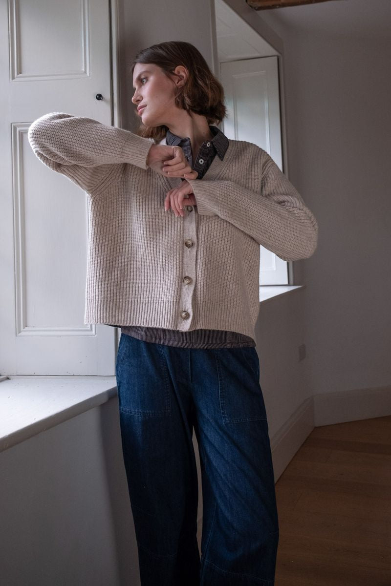 Image of model wearing BIBICO Fair Trade Clothing Adita Ribbed Cardigan in Natural White Wool