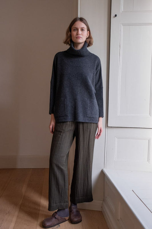 Image of model wearing BIBICO Fair Trade Clothing Orla Casual Wide Trousers in Olive Checkered Gauze Cotton