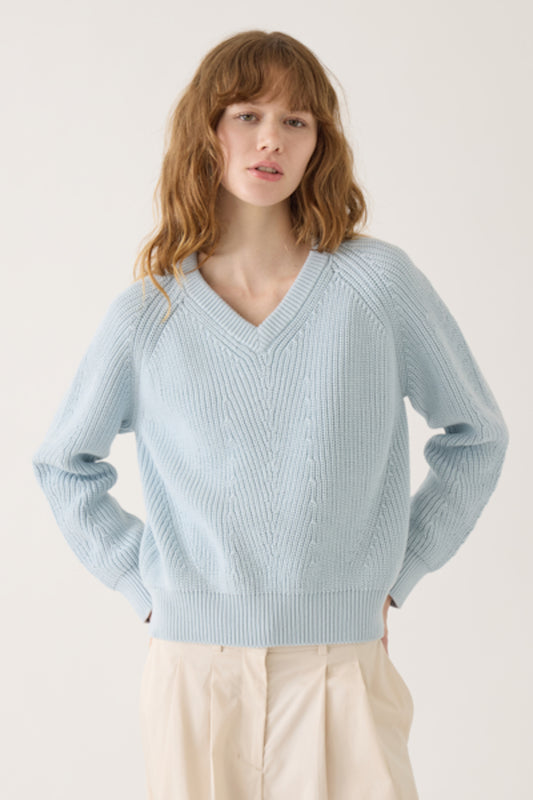 Image of DEMYLEE NEW YORK Mimi Washed Cotton Sweater in Icy Blue. Mimi is a chunky fitting sweater with open v-neckline. 