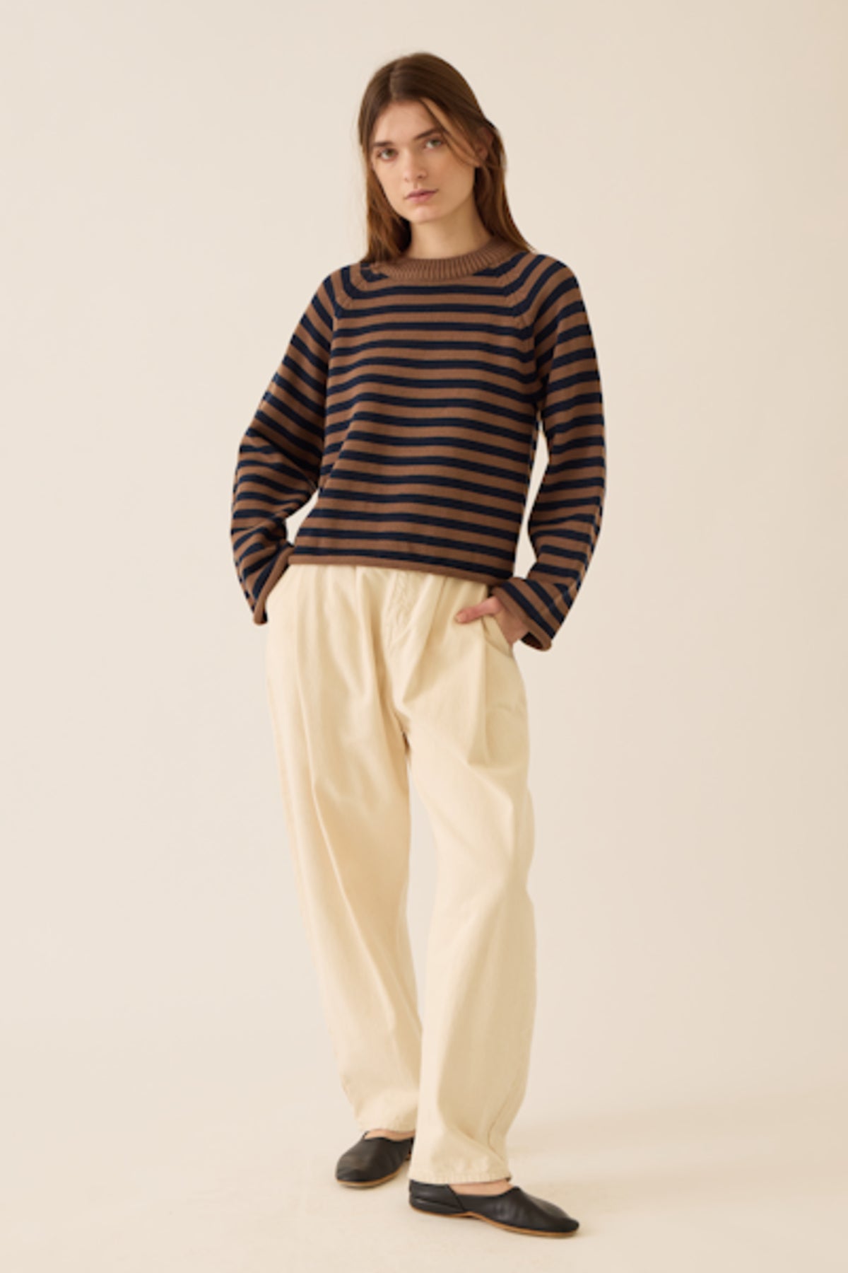 Image of model wearing DEMYLEE NEW YORK Andi Cotton Sweater in Navy on Mocha Stripe.