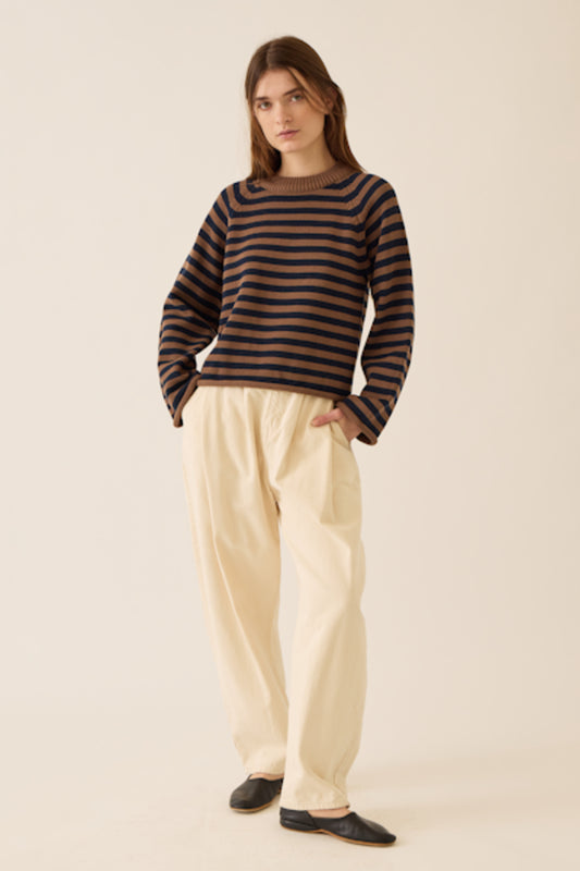 Image of model wearing DEMYLEE NEW YORK Andi Cotton Sweater in Navy on Mocha Stripe.