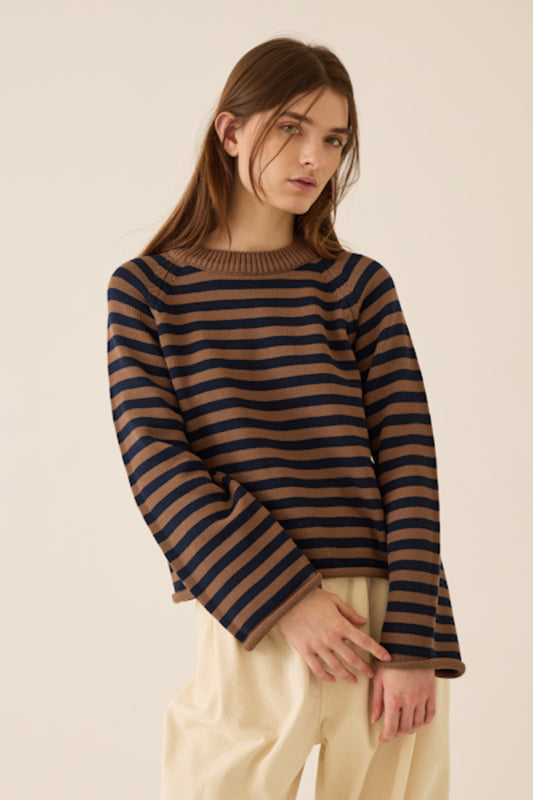 Image of model wearing DEMYLEE NEW YORK Andi Cotton Sweater in Navy on Mocha Stripe.