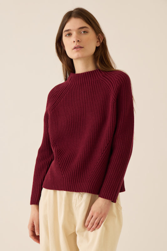 Image of model wearing DEMYLEE NEW YORK Daphne Cotton Sweater in Solid Burgundy.
