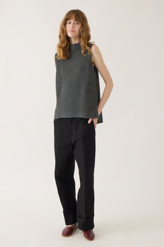 Image of DEMYLEE NEW YORK Delaney Cotton Vest in Charcoal. Delaney has a mock neck and side slits at hem for a flattering fit. Pull over styling.