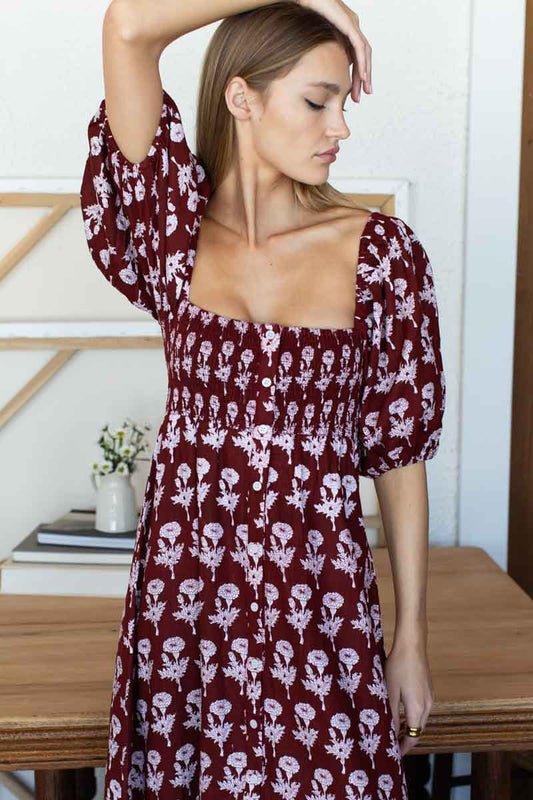 Image of model wearing EMERSON FRY LOVE TOMAS Santiago 4 Maxi Dress in Pressed Marigolds Rogue Linen. 