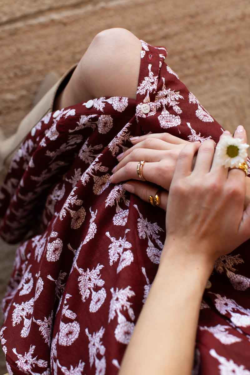Image of model wearing EMERSON FRY LOVE TOMAS Santiago 4 Maxi Dress in Pressed Marigolds Rogue Linen. 