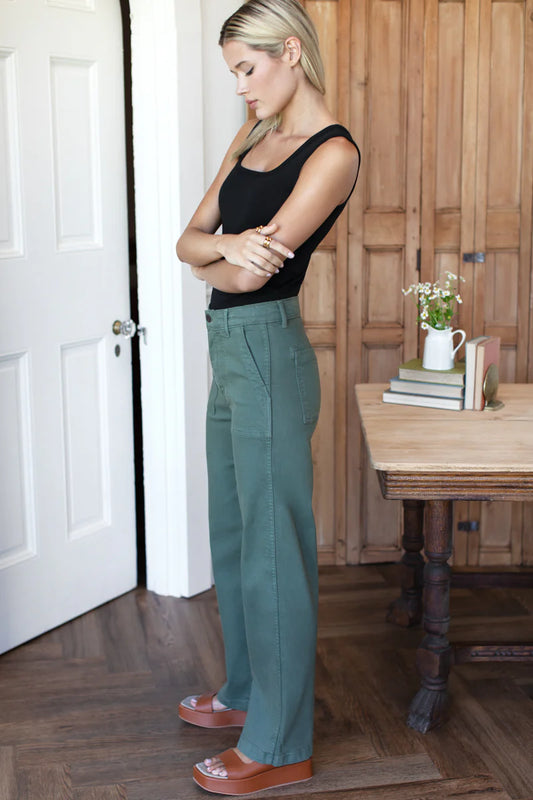Image of model wearing EMERSON FRY Vintage Long Army Pant in Green Cotton.