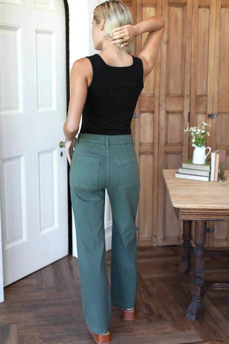 Image of model wearing EMERSON FRY Vintage Long Army Pant in Green Cotton.