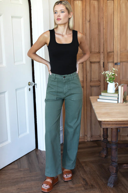 Image of model wearing EMERSON FRY Vintage Long Army Pant in Green Cotton.