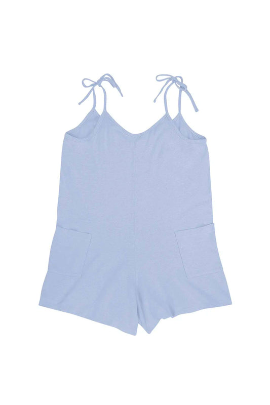Image of Jungmaven Sespe Romper in Coastal Blue. Sespe Romper is a short coverall style romper with front patch pockets and adjustable spaghetti straps that tie at shoulder. Made in USA from Hemp-Organic Cotton Blend fabric. 