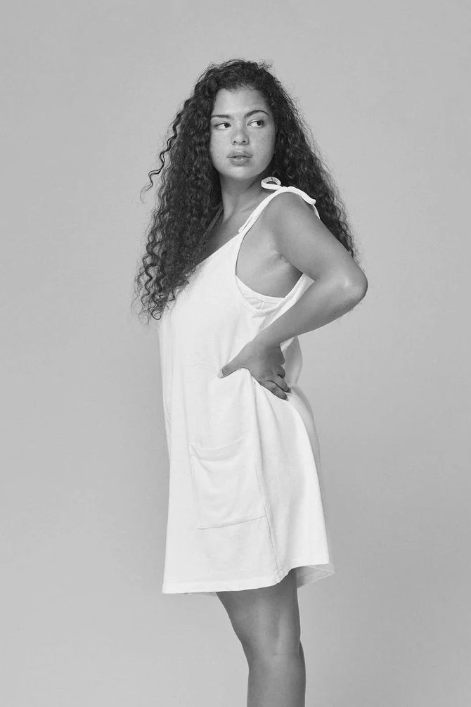 Image of Jungmaven Sespe Romper in Coastal Blue. Sespe Romper is a short coverall style romper with front patch pockets and adjustable spaghetti straps that tie at shoulder. Made in USA from Hemp-Organic Cotton Blend fabric. 