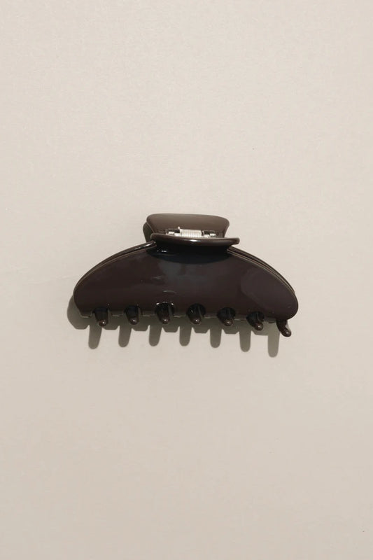 NAT AND NOOR Ethically Made Sustainable Hair Accessories - Large 4" Minimalist Hair Claw in Chocolate Brown on Flat Surface