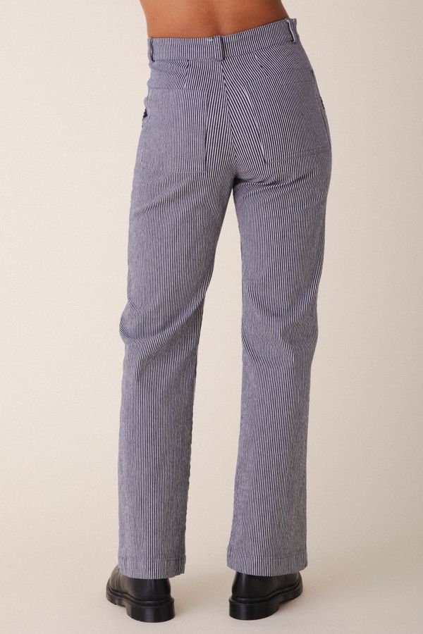 Image of model wearing Prairie Underground Long Smithy Pant in Oyster Stripe. Made in USA.