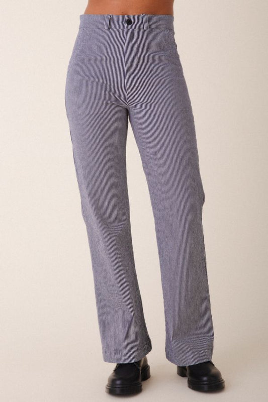 Image of model wearing Prairie Underground Long Smithy Pant in Oyster Stripe. Made in USA.