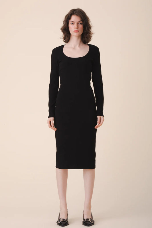 Image of model in Prairie Underground Organic Cotton Black Long Sleeve Ribbed Midi Bodycon Dress with Scoop Neckline _ Ethical Small Batch Women's Fashion Brands _ Eco-friendly Date Night Dresses _ Made in USA Women's Apparel