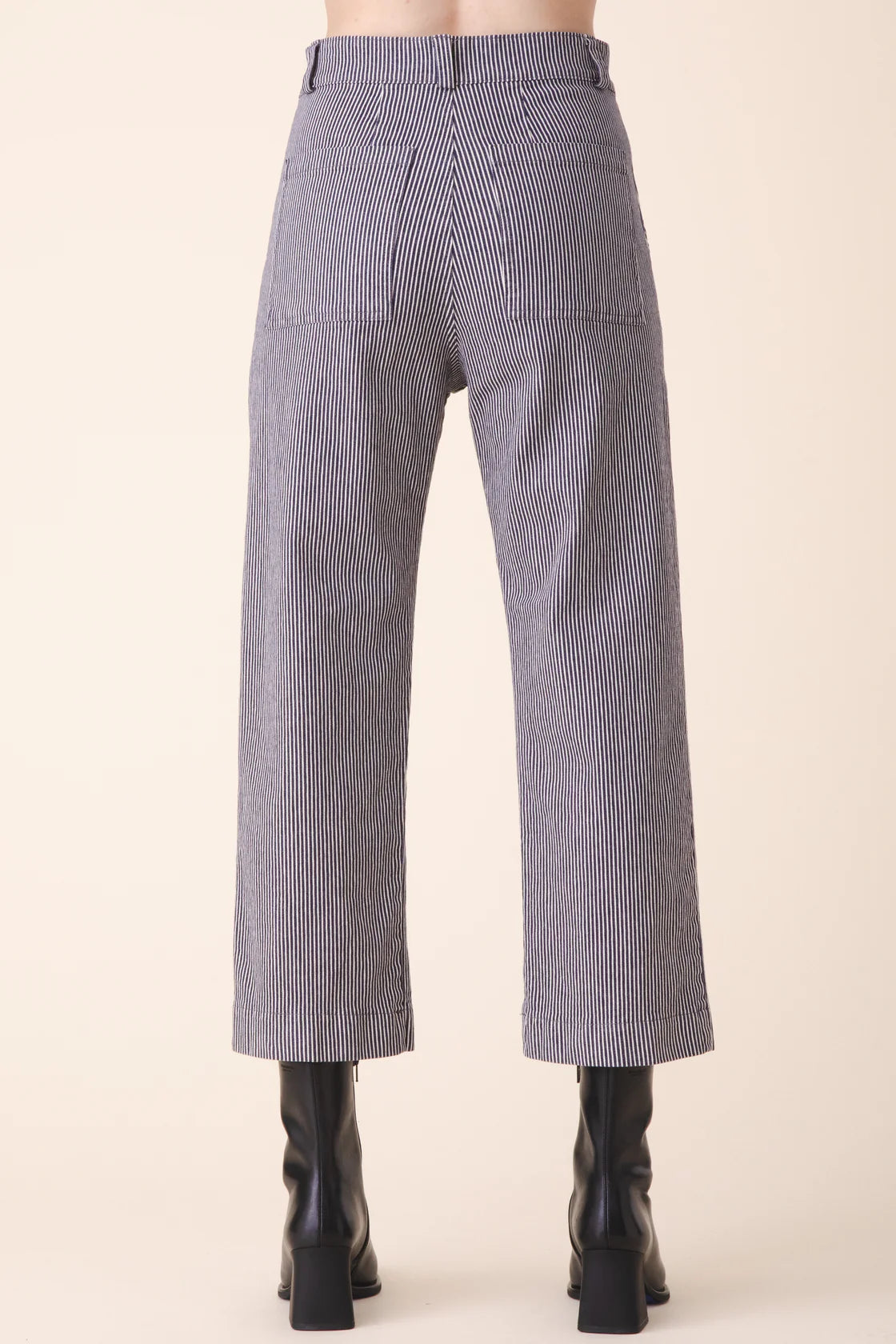 Image of model in Prairie Underground Oyster Grey and Black Striped Organic Cotton Smithy Utility Pants _ Ethical Small Batch Women's Fashion Brands _ Made in USA Women's Apparel