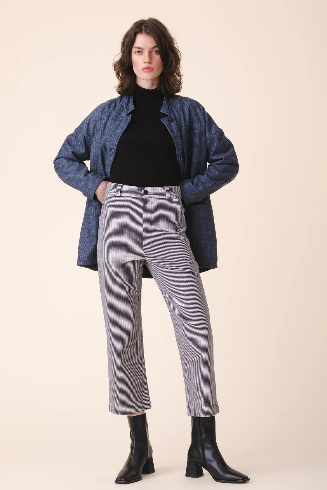 Image of model in Prairie Underground Oyster Grey and Black Striped Organic Cotton Smithy Utility Pants _ Ethical Small Batch Women's Fashion Brands _ Made in USA Women's Apparel