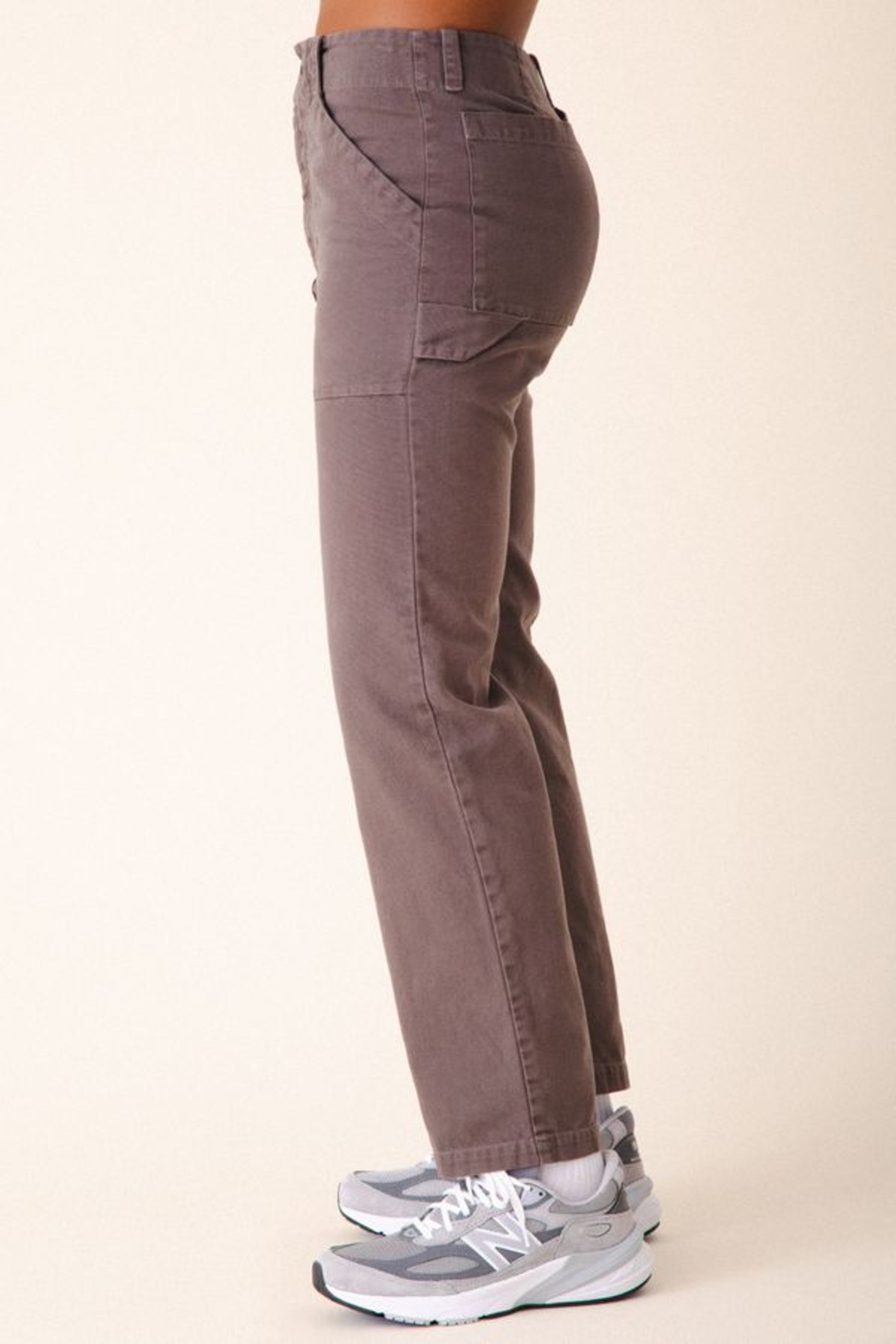 Image of model wearing Prairie Underground Utility Pant in Dior Grey Organic Cotton Canvas. Utility Pant is a work wear inspired style with a high rise and flattering fit. Designed and produced in Seattle, Washington, USA.