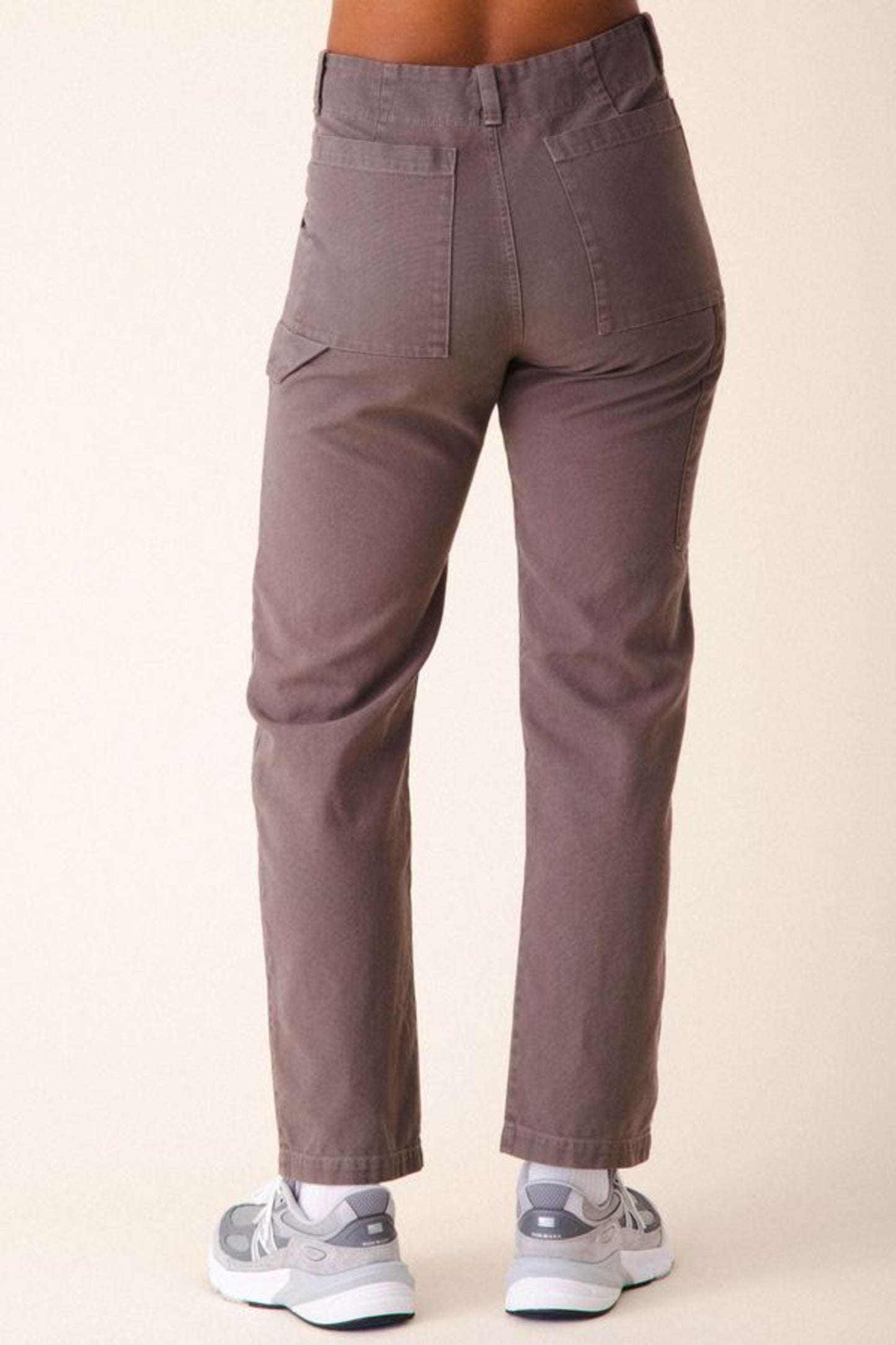 Image of model wearing Prairie Underground Utility Pant in Dior Grey Organic Cotton Canvas. Utility Pant is a work wear inspired style with a high rise and flattering fit. Designed and produced in Seattle, Washington, USA.