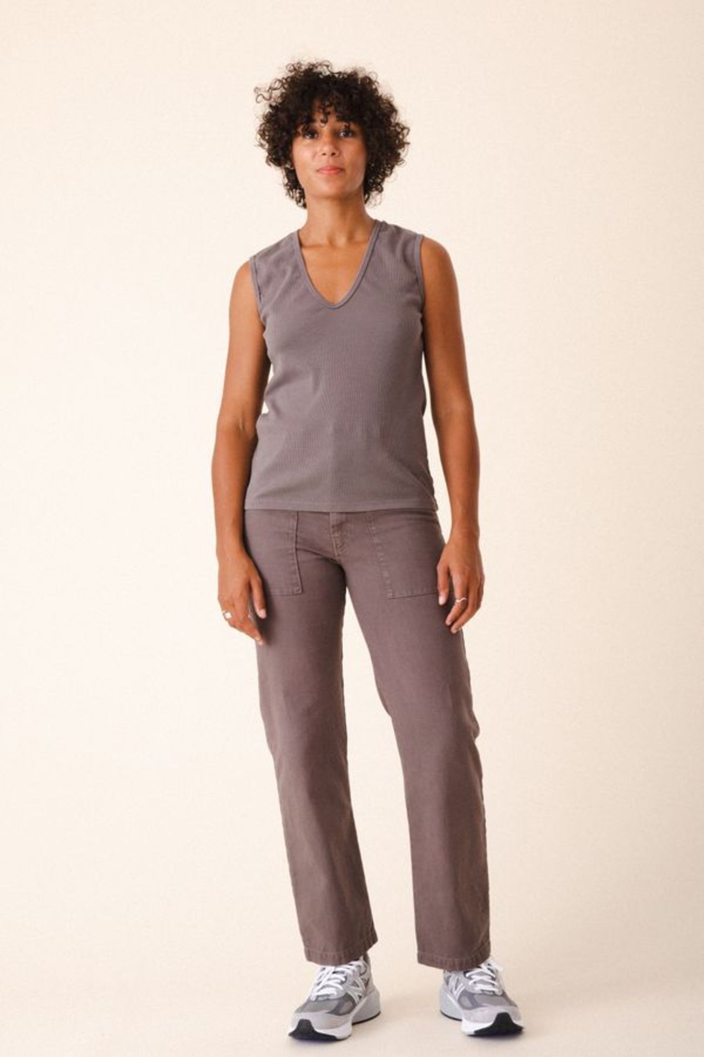 Image of model wearing Prairie Underground Utility Pant in Dior Grey Organic Cotton Canvas. Utility Pant is a work wear inspired style with a high rise and flattering fit. Designed and produced in Seattle, Washington, USA.