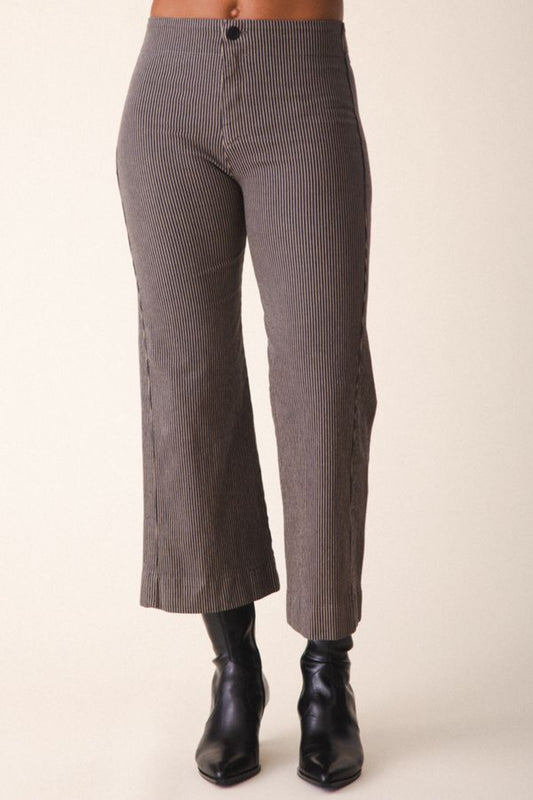 Image of model wearing Prairie Underground Knack Pant in Khaki Railroad Stripe. Knack Pant is a cropped, wide leg, high-stretch pant with flattering darting and zip closure. Designed and produced in Seattle, Washington, USA.