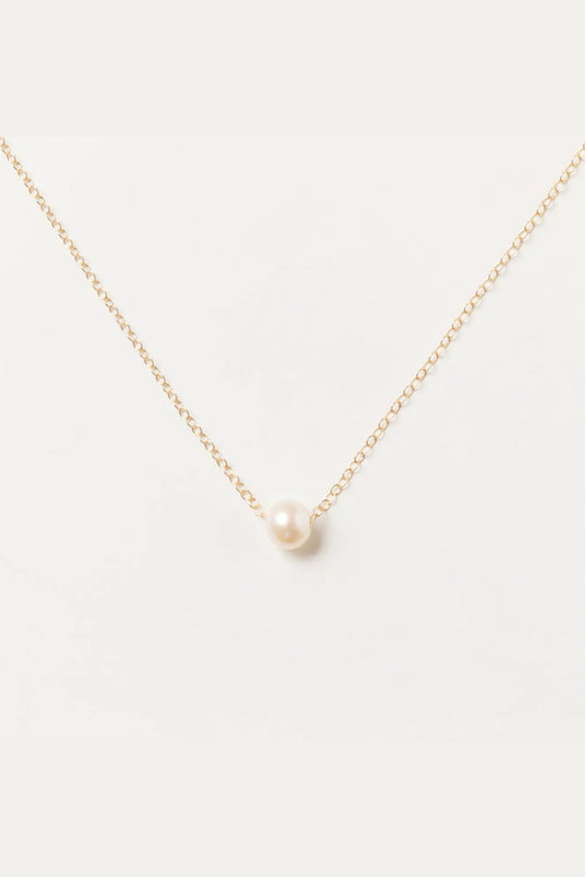Image of Sheena Marshall Jewelry handmade Pearl Grit Necklace - single pearl strung on 14k goldfill chain. Simple, luxurious jewelry handmade in Denver, Colorado. 