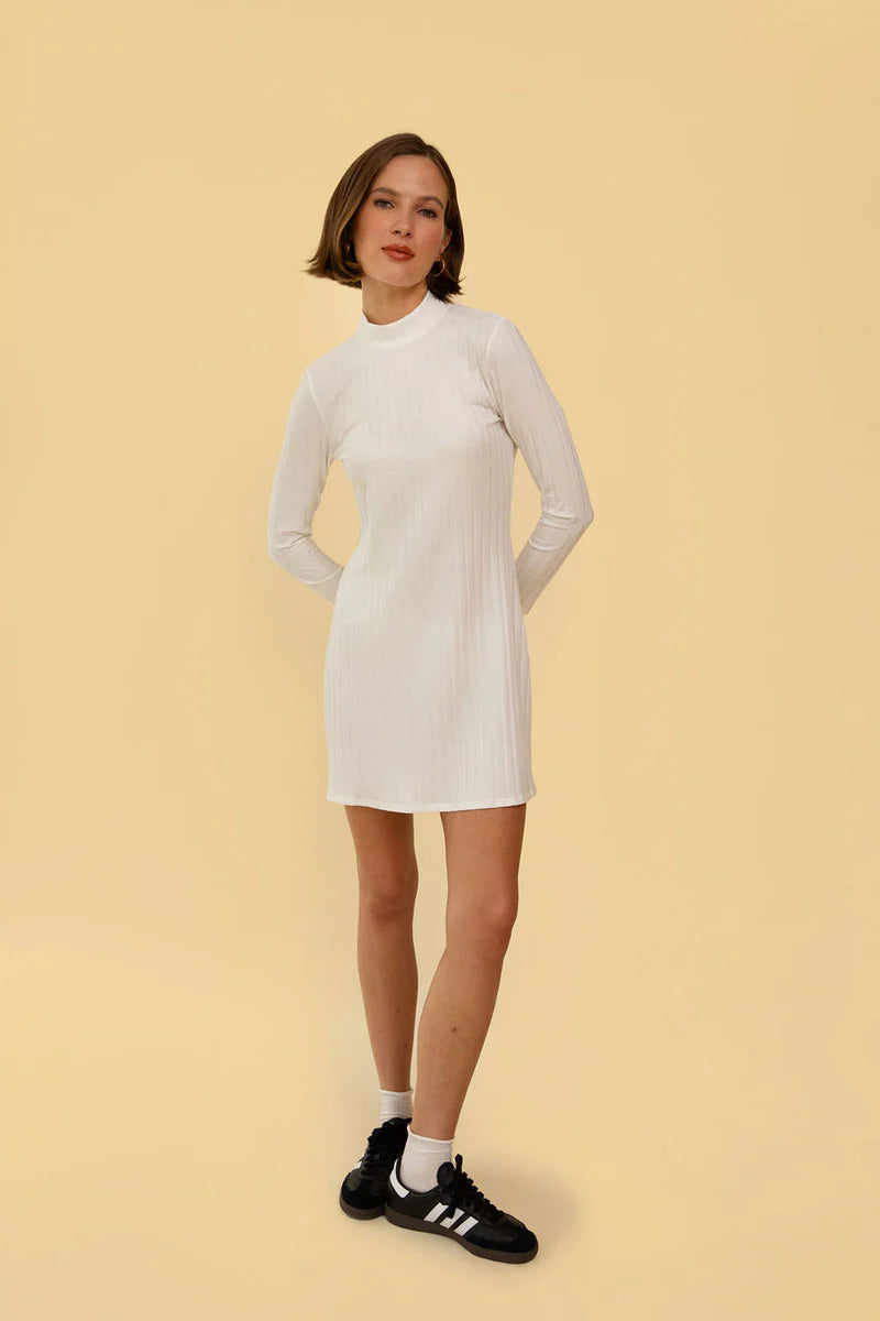 Image of model in Whimsy and Row Cream White Gigi Ribbed Turtleneck Mini Dress _ Eco Friendly Women's Fashion  _ Made in Los Angeles USA Women's Apparel