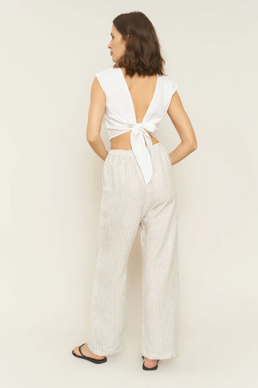 Image of model wearing Whimsy + Row Kira Pull-On Wide Leg Pant in Stripe Linen. Made in Los Angeles.