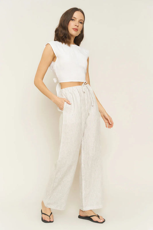 Image of model wearing Whimsy + Row Kira Pull-On Wide Leg Pant in Stripe Linen. Made in Los Angeles.